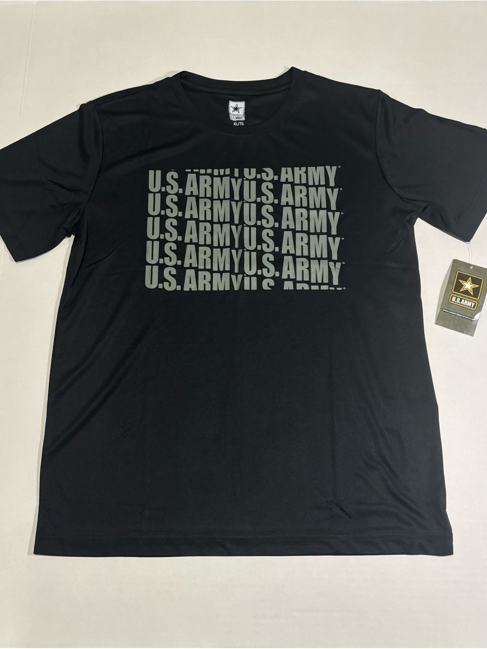 short-sleeve performance t-shirt featuring a stealth stacked "U.S. ARMY” kids XL